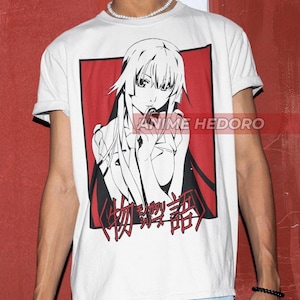 May include: White t-shirt with a red square graphic featuring a black and white anime character with long black hair. The character is biting her lip and the text "物  语" is below her.