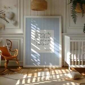 Christian wall decor for nursery room featuring soft blue tones and Bible verse typography.
