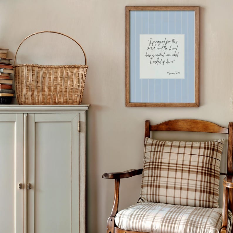 Neutral blue nursery wall art featuring scripture quote from 1 Samuel 1:27.