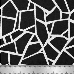 Può includere: Tessuto geometrico bianco e nero con un motivo lineare. Il design presenta forme irregolari delineate in bianco su sfondo nero. Un righello in centimetri è in basso.