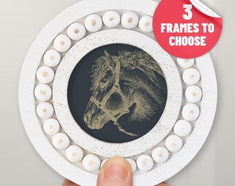 May include: White round wooden frame with a beaded border, featuring a black and gold illustration of a horse's head.  "3 Frames To Choose" is written on a red sticker.