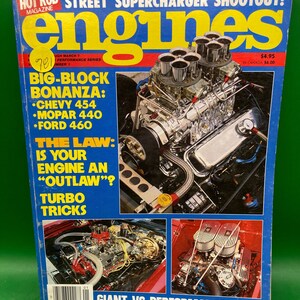 May include: A magazine cover for Engines magazine, featuring a close-up of a chrome engine with multiple carburetors. The cover text reads "Street Supercharger Shootout!" and "Big-Block Bonanza: Chevy 454, Mopar 440, Ford 460".