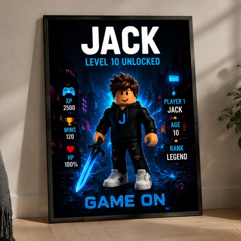 May include: A framed poster featuring a cartoon character in a black hoodie with a blue J, holding a glowing blue sword. Text includes JACK, LEVEL 10 UNLOCKED, XP 2500, WINS 120, HP 100%, PLAYER 1 JACK, AGE 10, RANK LEGEND, and GAME ON in blue and white.