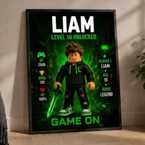 May include: A framed rectangular poster featuring a block-style character in a black hoodie and green sneakers holding a glowing green sword. The text reads LIAM, LEVEL 10 UNLOCKED, PLAYER 1, AGE 10, RANK LEGEND, and GAME ON, with icons for XP, WINS, and HP.
