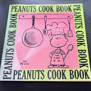 "Vintage ""Peanuts Kochbuch"" ,veröffentlicht 1969. Ein Kochbuch mit Rezepten von Juni Dutton, Illustrationen von Charles M. Schulz." Lunchbag