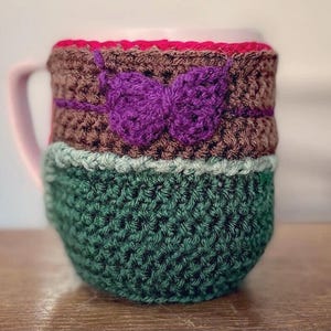 Crocheted Brown Mermaid Mug Cozy with Purple Shell Bra, Built-in Coaster