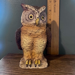A vintage Lefton owl coin bank, 1970s. Ceramic, porcelain, figurine of a brown owl with detailed feather textures and a slot for coins.
