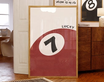 May include: A red and white poster with a black number 7 inside a circle. The poster has the word "LUCKY" written above the circle. The poster is framed in wood.