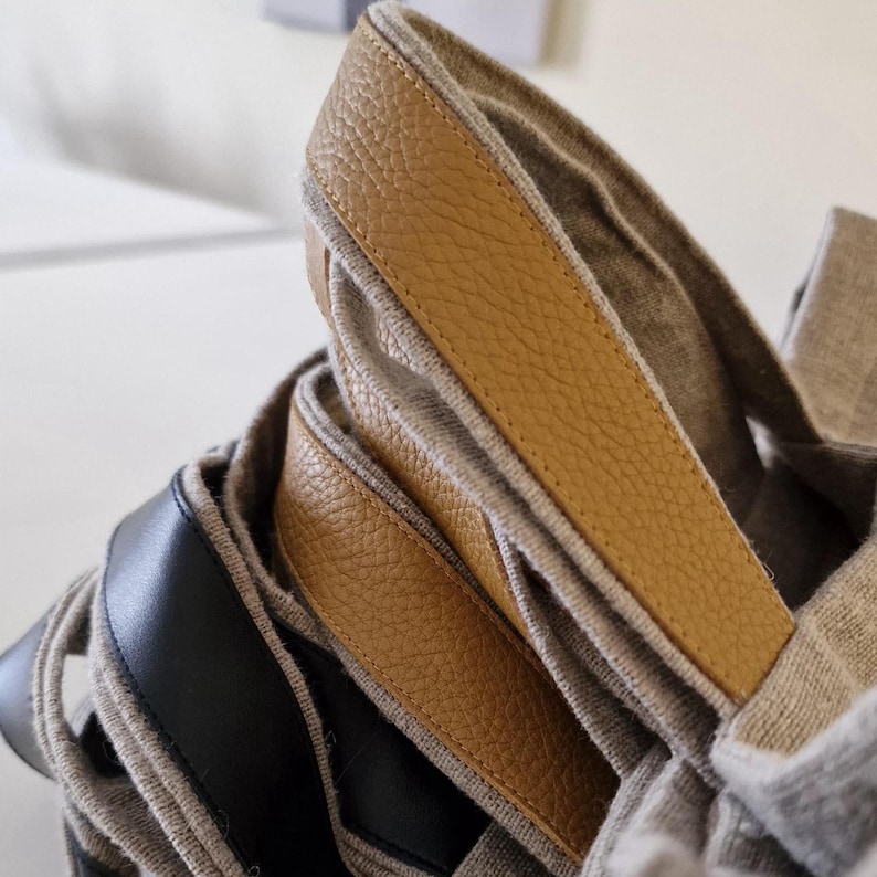 Linen bag with black and yelow leather handles
