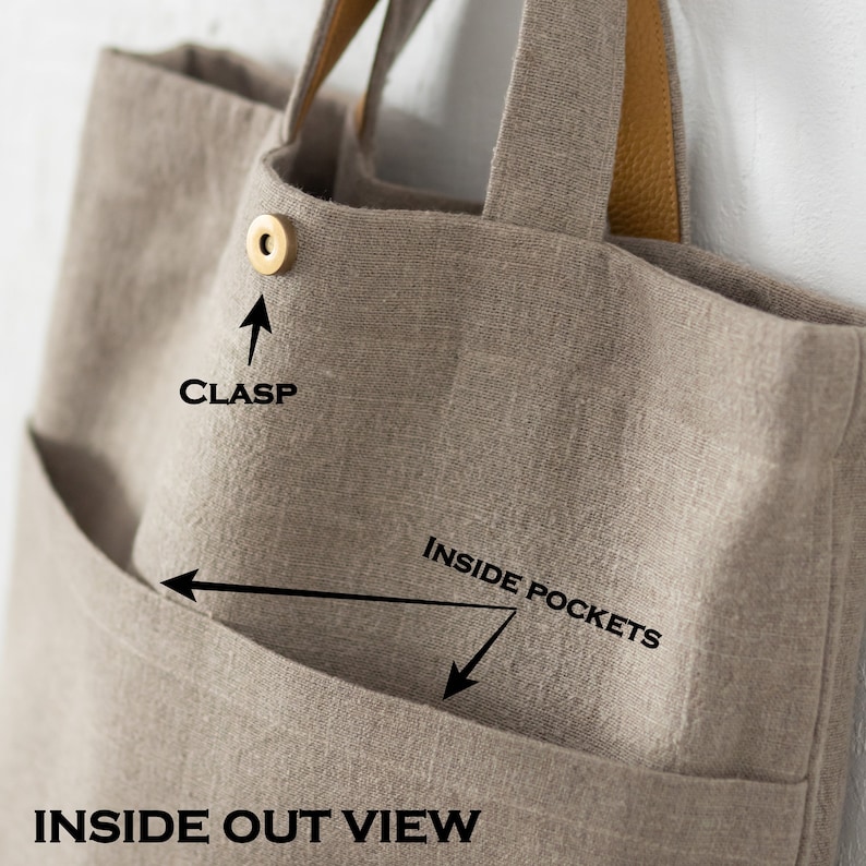 Inside out view of natural linen bag with pockets and clasp