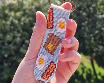 Llavero anudado, patrón Alfa, regalo único, accesorios hechos a mano, tostadas de desayuno, tocino y huevo, adornos para bolsos
