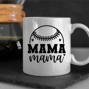 May include: White ceramic mug with a black baseball graphic and the text "MAMA mama" in black.
