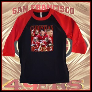 Christian McCaffrey DTF Camiseta de béisbol roja/negra n.° 1 (Unisex)
