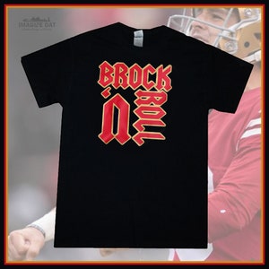 Brock Purdy &#39;BROCK&#39;N ROLL&#39; Männer Tshirt (Schwarz)