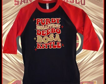 49er&#39;s  &#39;Purdy McCaffrey Deebo Bosa Kittle&#39; DTF Black/Red Baseball Tee (Unisex)
