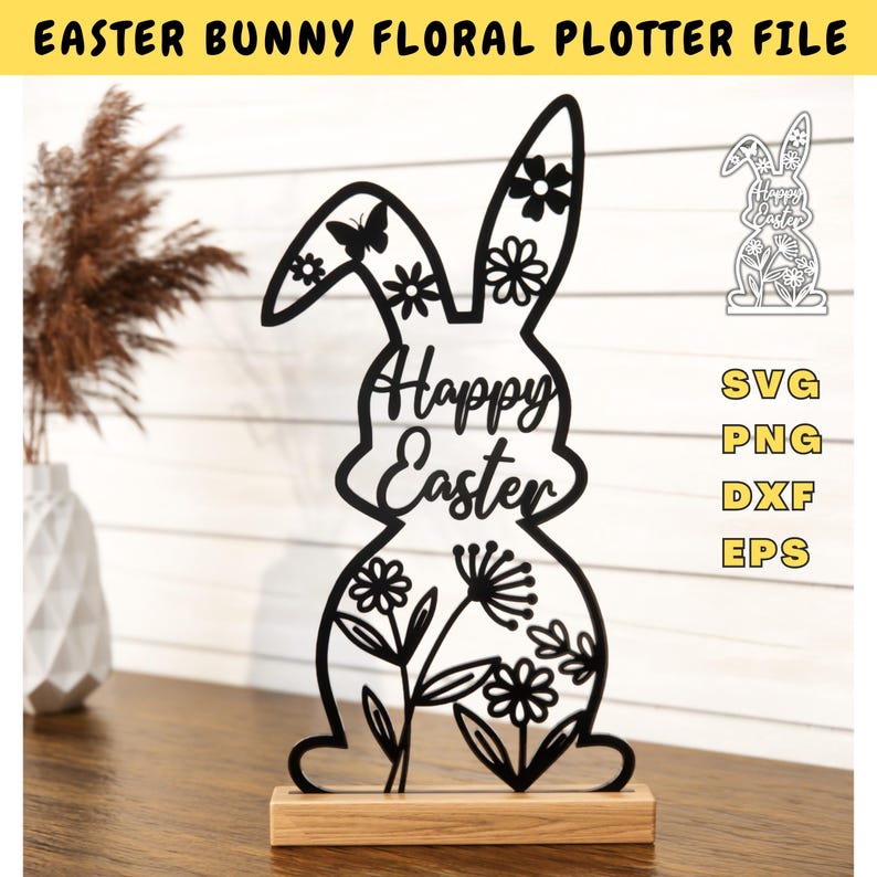 May include: Black silhouette of an Easter bunny with floral details and the text "Happy Easter". The bunny is standing on a wooden base.