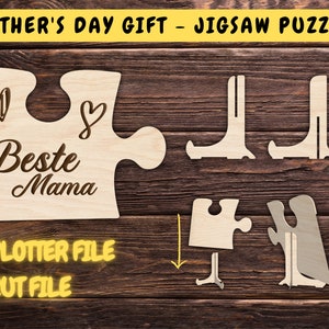 以下が含まれることがあります： 「Beste Mama」という言葉と2つのハートが描かれた木製ジグソーパズル。パズルはハート型に組み立てるように設計されています。画像には、パズルピースを組み立てて作ったスタンドも表示されています。
