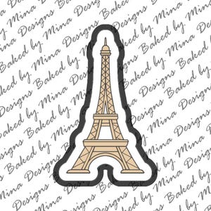 May include: A black and white sticker of the Eiffel Tower in Paris, France. The sticker is outlined in black and has a white background.