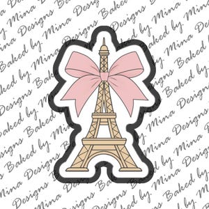 May include: A black and white illustration of the Eiffel Tower with a pink bow on top. The illustration is on a white background.