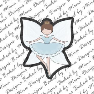 May include: A blue and white ballerina cookie cutter with a butterfly design. The cutter is made of metal and has a smooth finish.