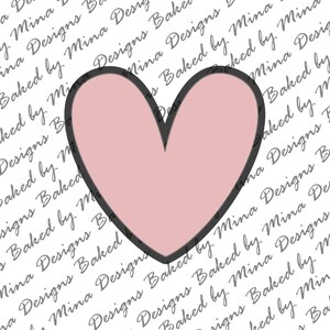 May include: A pink heart with a thick black outline. The heart is on a white background with the text "Baked by Mina Designs" repeated in black.
