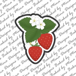 May include: A sticker featuring a cartoon illustration of two red strawberries with green leaves and white flowers. The strawberries are on a white background with a black border.