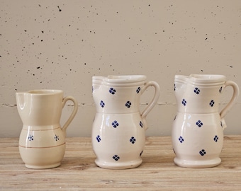 Pitcher traditional blue flowers Apulian ceramic jug with glazed ceramic handle hand-decorated majolica glaze Italy clay