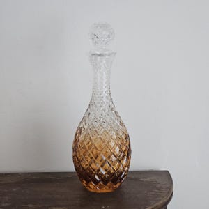 Murano blown glass carafe serving bottle in shaded amber. Liquor and beverage service for the table, bar.