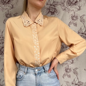 Vintage yellow blouse with embroidery, elegant women’s shirt