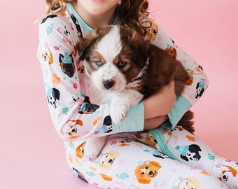 Howliday Nude Pink Dog Print Christmas Bamboo Pajamas for babies and toddlers