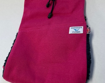 Mermaid's Purse wearable hot water bottle rucksack. Ideal for pain relief period pain and back pain .Keep warm at home at the office .