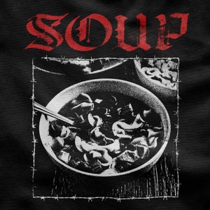May include: A black and white image of a bowl of soup with the word "SOUP" in red letters above it. The bowl is surrounded by barbed wire.