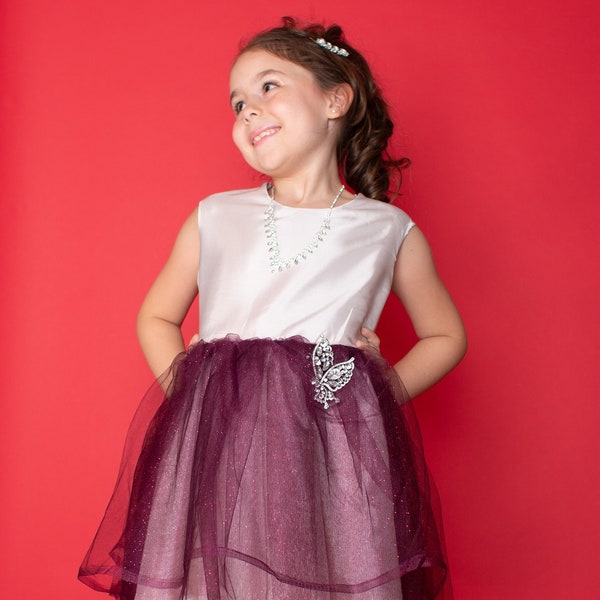 Knee length shiny satin top with different color options sparkle tulle bottom fun and twirly dress designed by Charlie
