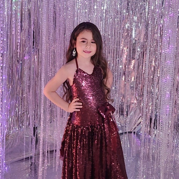 Floor length sequin gown, lined with heart shaped top ties around the neck princess dress