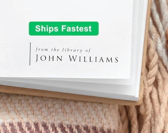 May include: A white rectangular paper label featuring the black printed text from the library of JOHN WILLIAMS, accompanied by a vertical black line to the left of the text. A green rectangular badge with white text reads Ships Fastest.