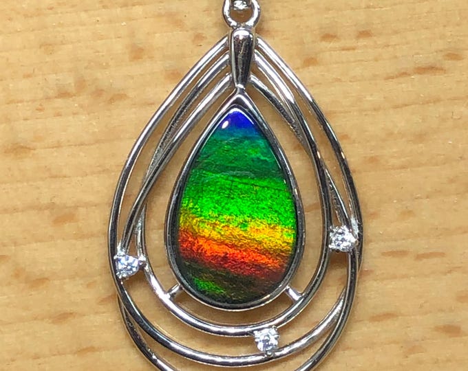 Featured listing image: Ammolite Pear Pendant: Rhodium Plated Sterling Silver, White Sapphire, 16-inch Chain Included, AAA Ammolite