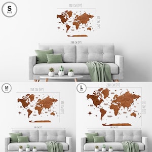 May include: Three sizes of a cork world map wall decor. The map is made of cork and has a brown color. The map is shown on a white wall with a couch in front of it. The sizes are S, M, and L. The measurements are in centimeters and inches.