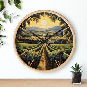 May include: A round wall clock with a wooden frame and a colorful image of a vineyard landscape. The clock face features black hands and Roman numeral markings.