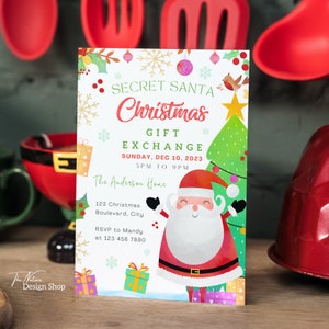 May include: A festive Christmas invitation with a cartoon Santa Claus, a Christmas tree, and presents. The invitation reads "Secret Santa Christmas Gift Exchange" with the date and time of the event. The address is "The Anderson Home, 123 Christmas Boulevard, City". RSVP information is provided.