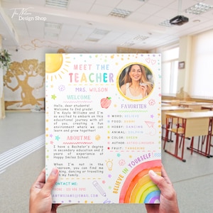 May include: Meet the Teacher poster with a rainbow background and a picture of a smiling teacher. The poster includes the teacher's name, welcome message, about me section, and favorite things. The text on the poster says "Meet the Teacher, Mrs. Wilson, Welcome, About Me, Favorites, Believe in Yourself!"