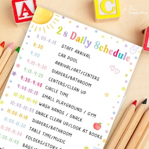 May include: A colorful 2's Daily Schedule, featuring a sun illustration and a list of activities. The schedule includes times for staff arrival, carpool, art, diaper changes, circle time, and snack. Wooden pencils and alphabet blocks surround the schedule.
