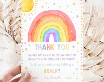 May include: A rainbow-themed thank you card with a watercolor rainbow, a sun, and stars. The text reads "Thank You. The party was fun and the cake was sweet, but having you as my guest made it all complete. Thank you for making my birthday so bright. Love, Amanda."