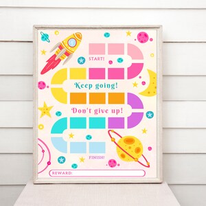May include: A printable space-themed reward chart with a rocket ship, planets, and stars. The chart has a start and finish line, and spaces for writing in tasks and rewards. The text on the chart says "Keep going!" and "Don't give up!"