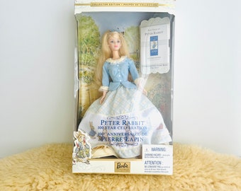 Barbie vintage / édition collector des 100 ans Peter Rabbit / Comprend la boîte d'origine - NON scellée. La boîte a été ouverte et la poupée a été remise en place