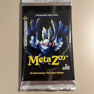 MetaZoo Booster Pack Crypted Nation 2ª Edição - Arte do pacote aleatório