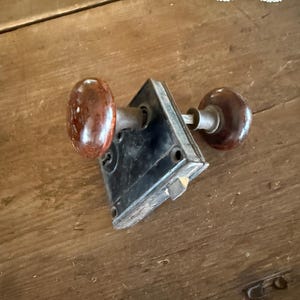 Vintage Brown-Speckled Clay Doorknob Set