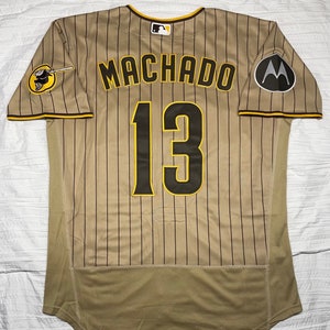 Nike Youth San Diego Padres Manny Machado #13 2022 City Connect T-Shirt