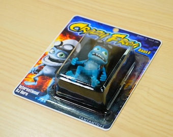 Ręcznie robiona figurka z żywicy Crazy Frog – w opakowaniu z tektury – uroczy towarzysz biurka