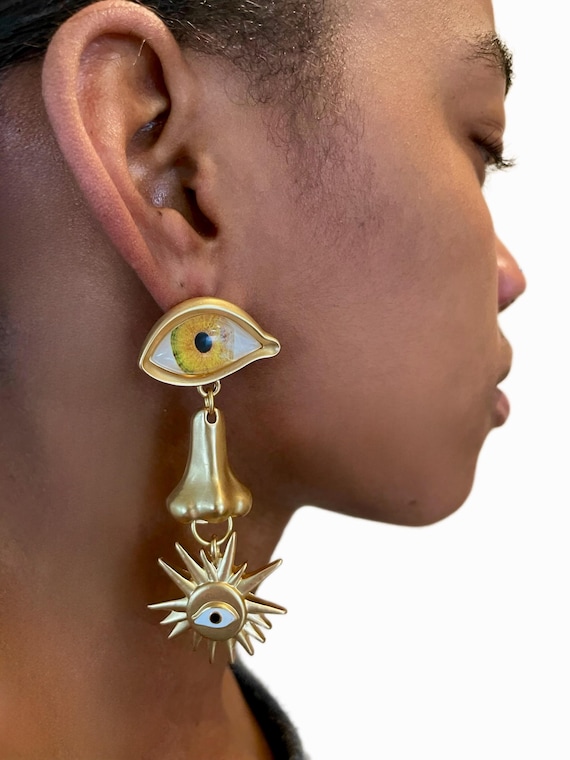 Schiaparelli earrings discount