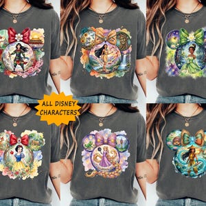 May include: Grey t-shirts with Disney character designs in a Mickey Mouse head shape. Each design features a different princess, with the text "ALL DISNEY CHARACTERS" in a yellow starburst.